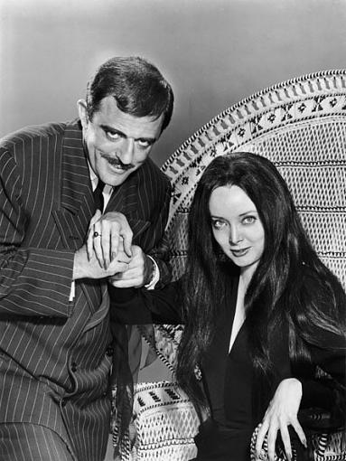 5 Top Tom Cruise movies-morticia-gomez-addams-family-5313395-445-592.jpg